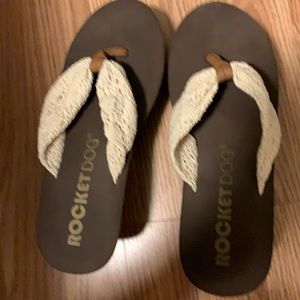 Brown flip flop wedges by Rocket Dog